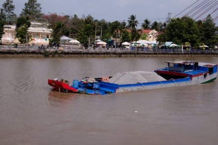 Barges as seen in Vietnam on a cruise along the Mekong Delta